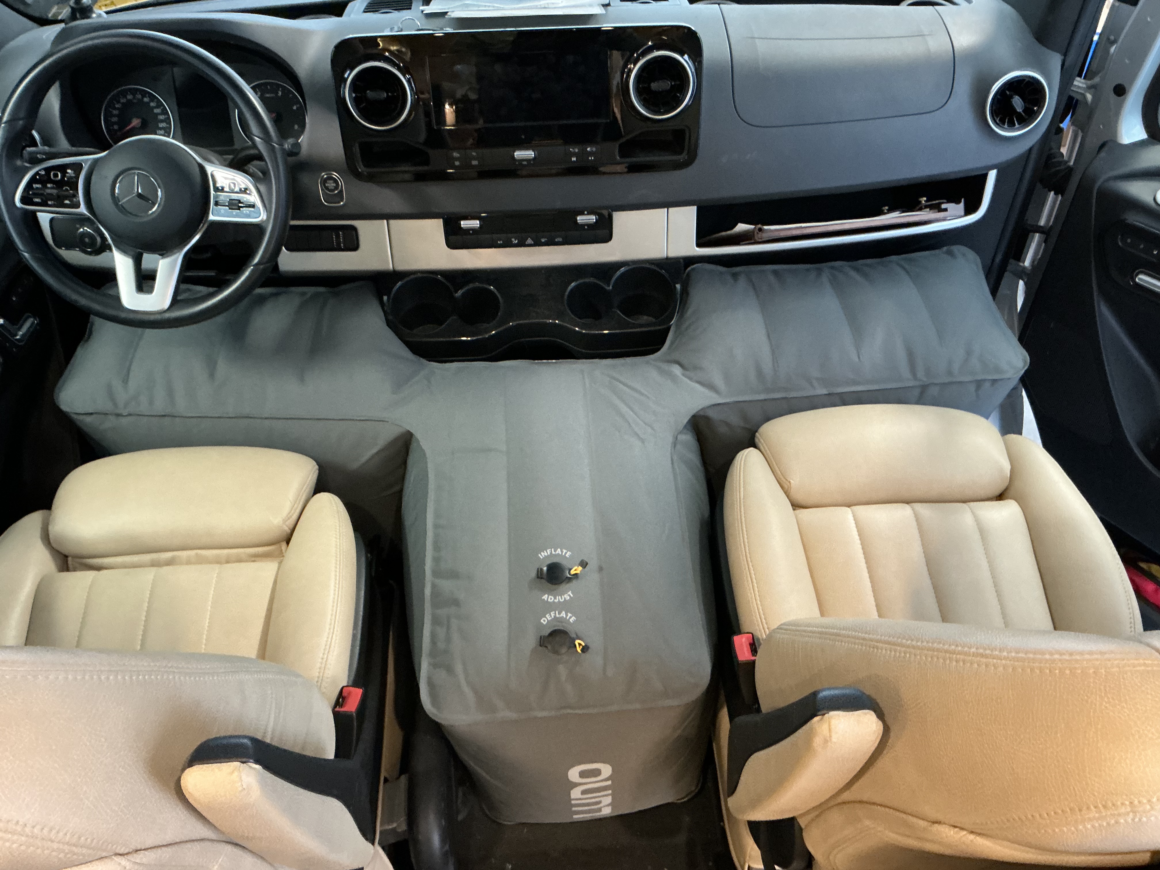 The “T-shaped” air mattress between the two front seats in the Mercedes Sprinter