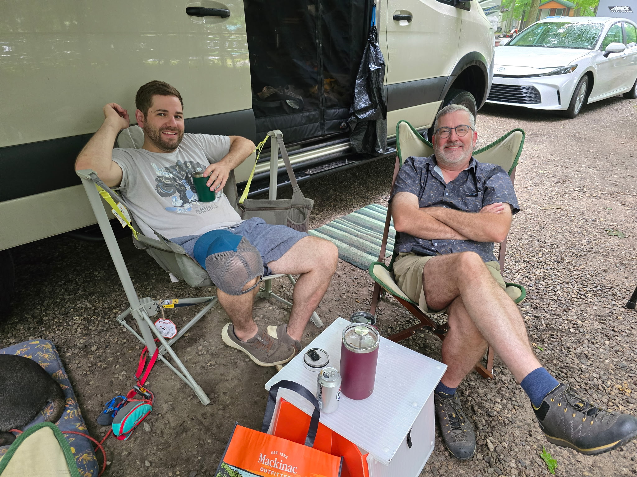 Father and son - solving some of the world’s  problems over morning coffee at the campsite. 