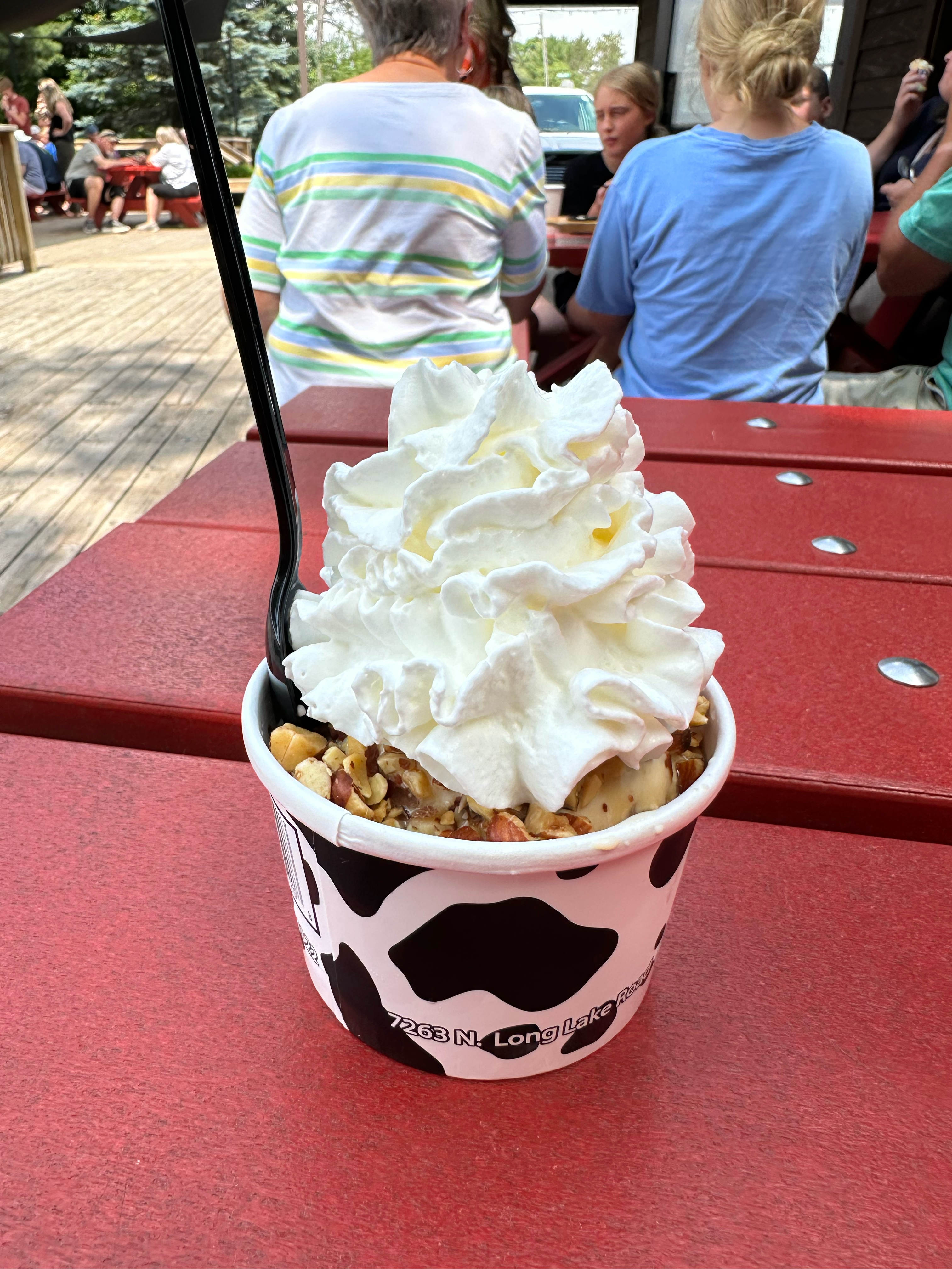 I enjoyed a butter pecan sundae with maple syrup topping, almonds, whipped cream and a cherry