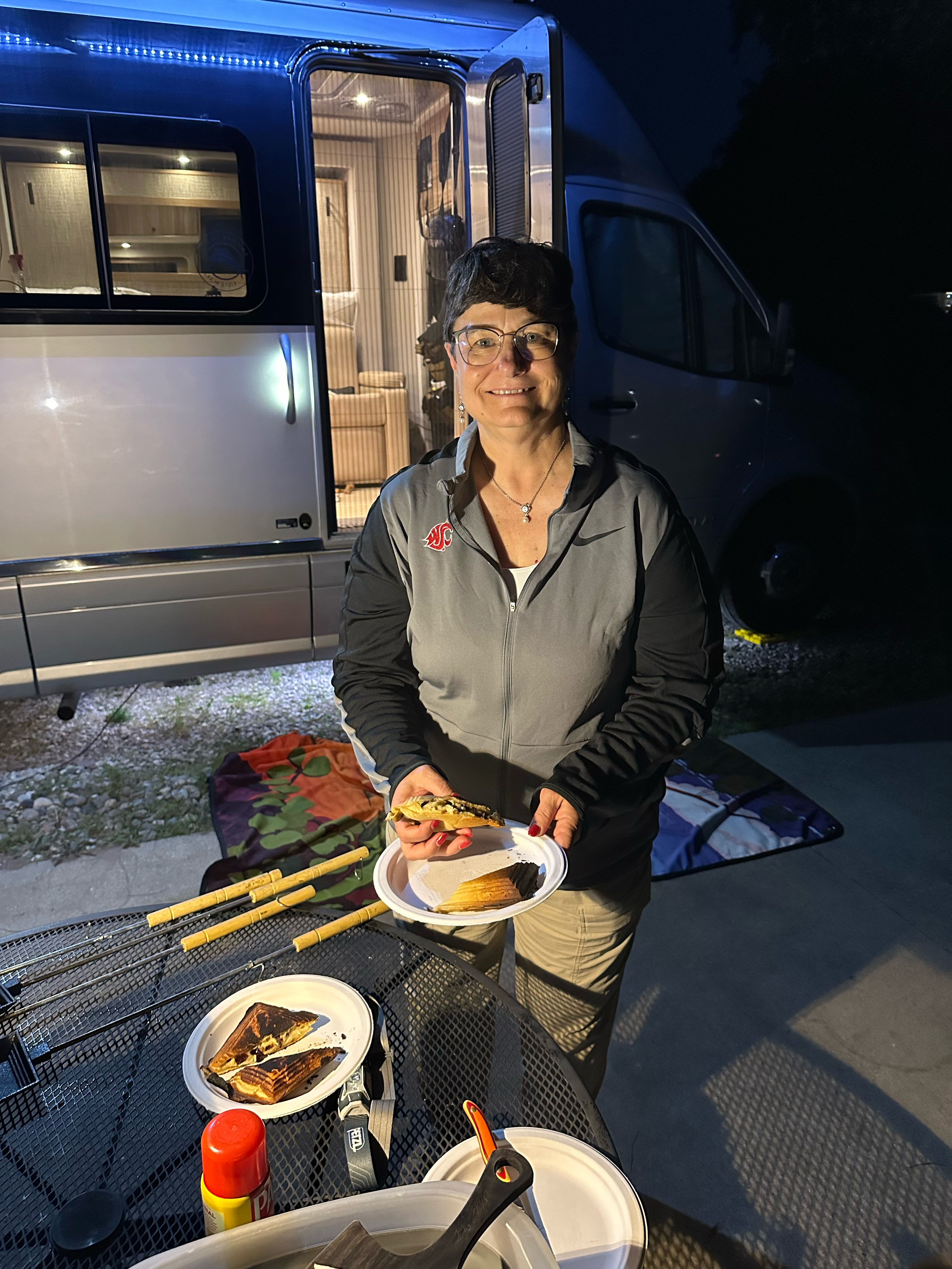 Chef Noel showing off one of her savory campfire pies 