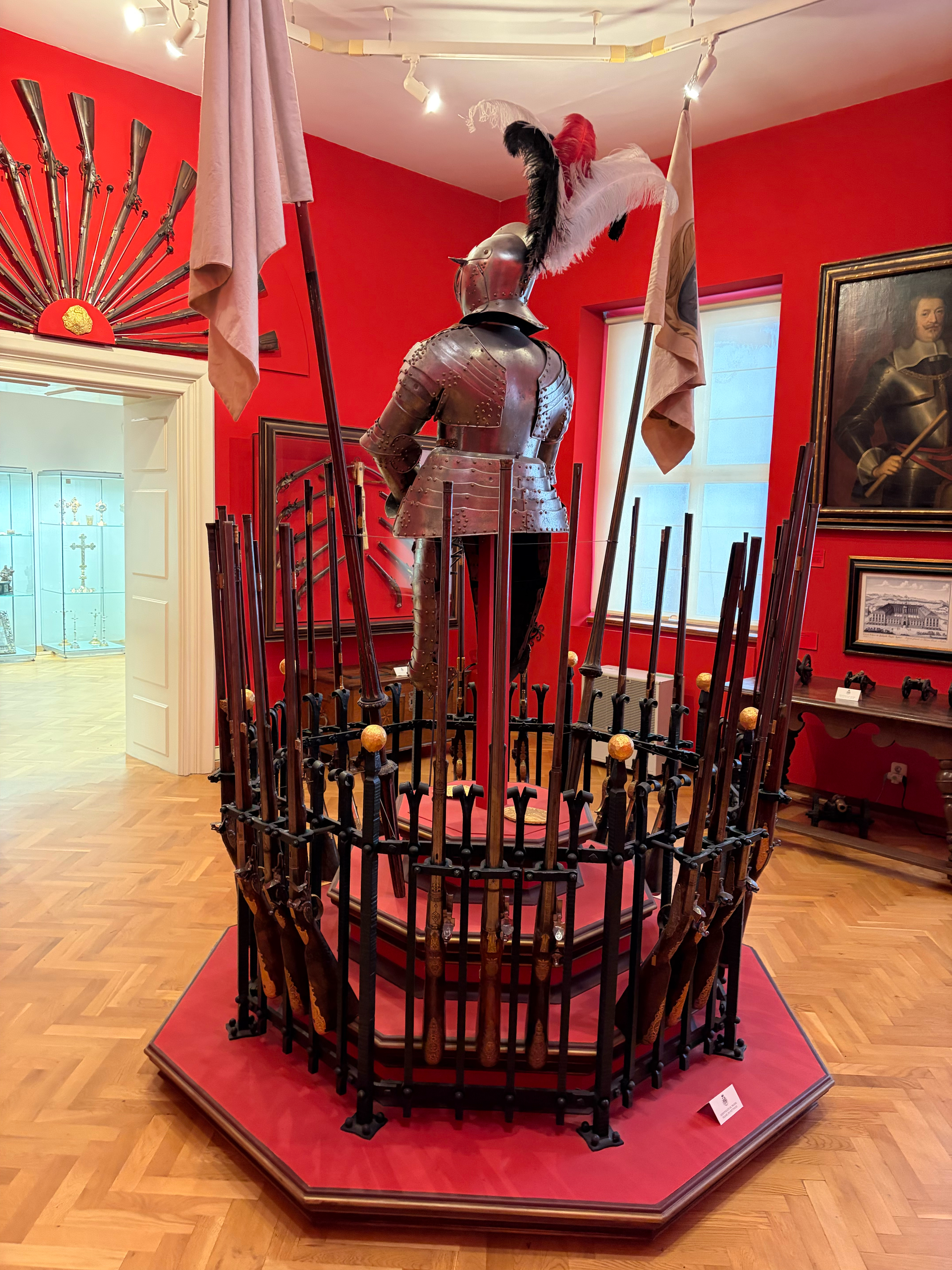 The armory with a lot of rifles, swords and pistols 