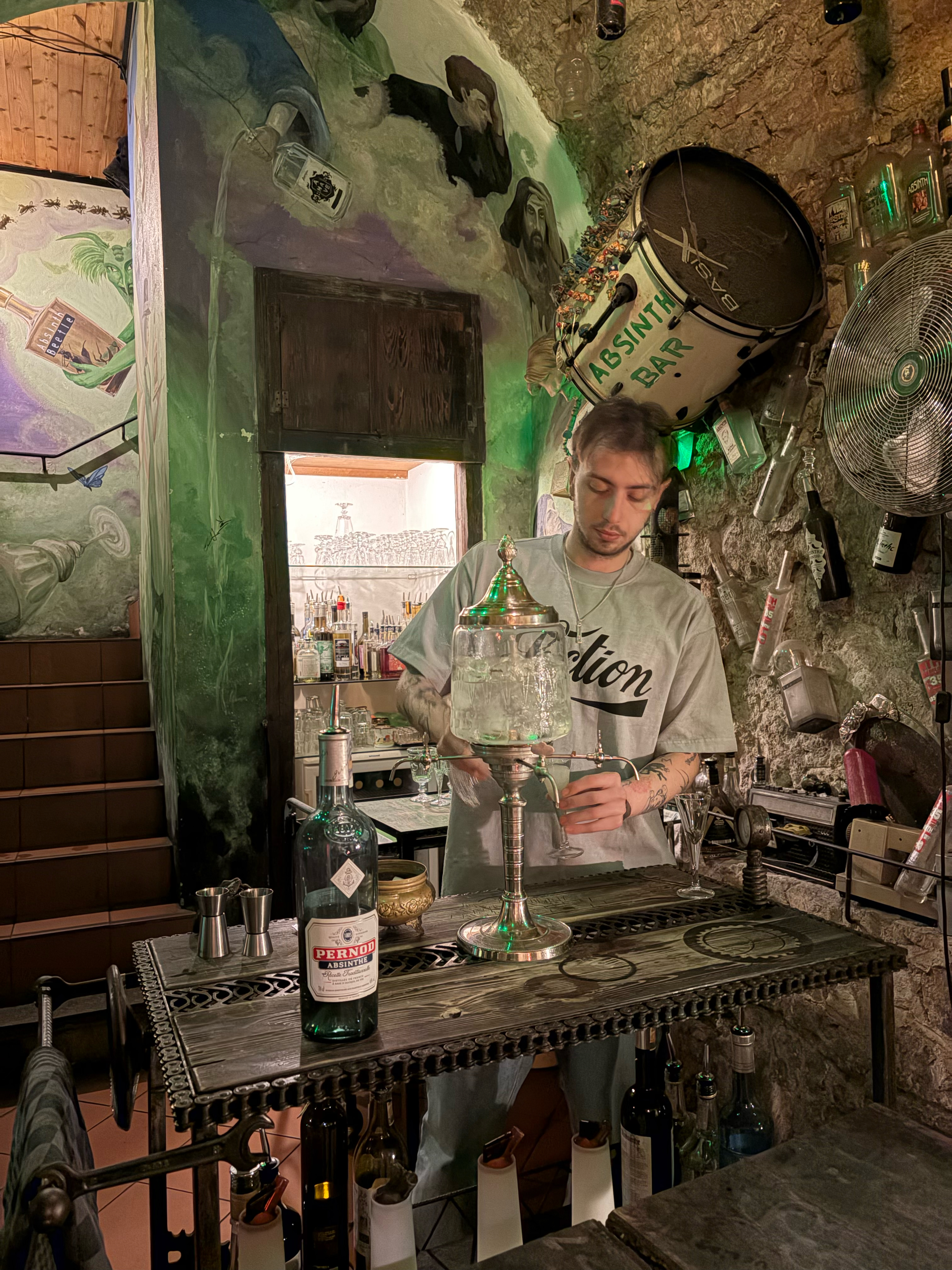 The ice water dispenser has several taps to use in the preparation of Absinthe for drinking.