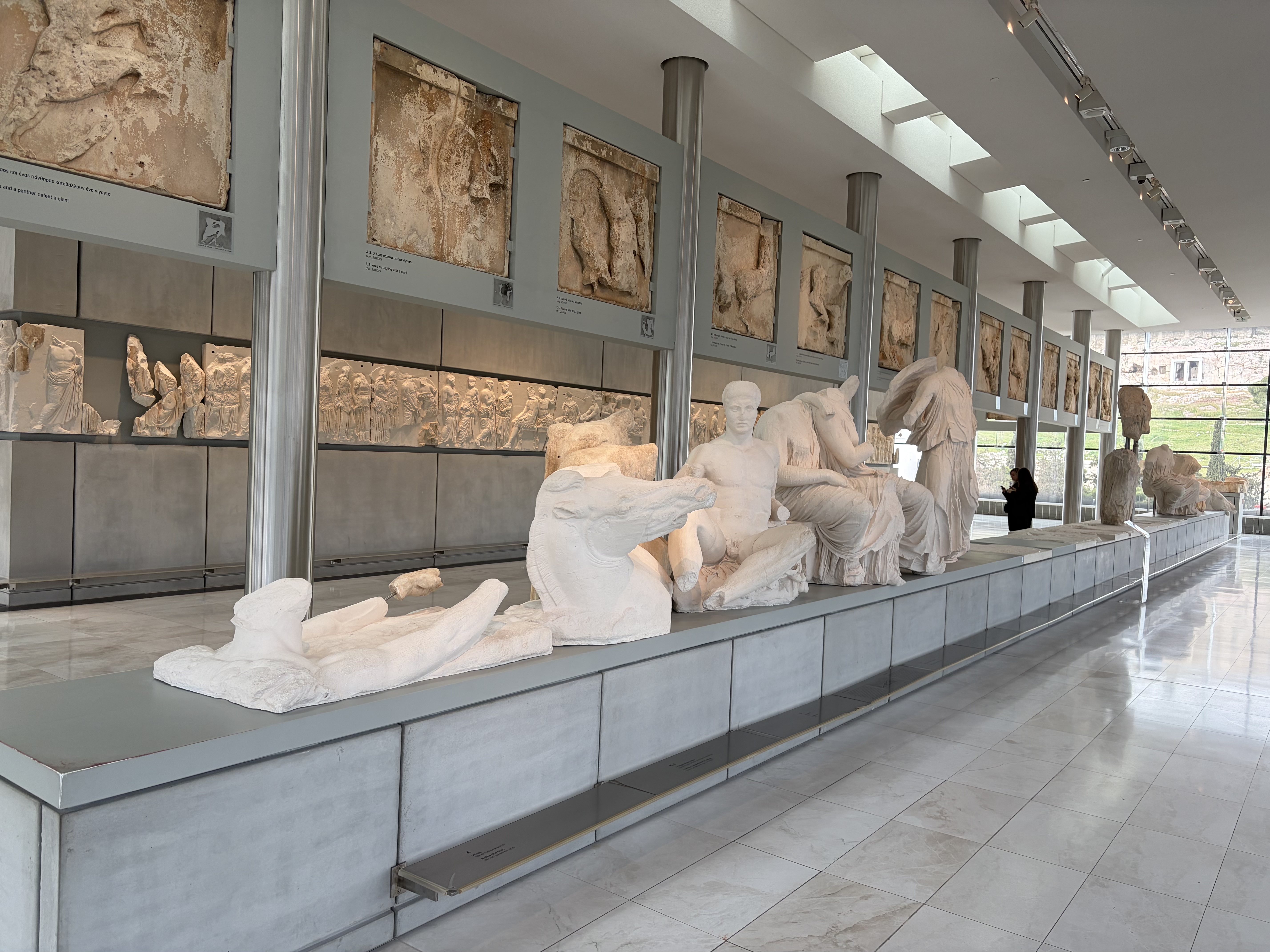 These are the remains of the statues above the entrance to the temple - as shown in the models. 