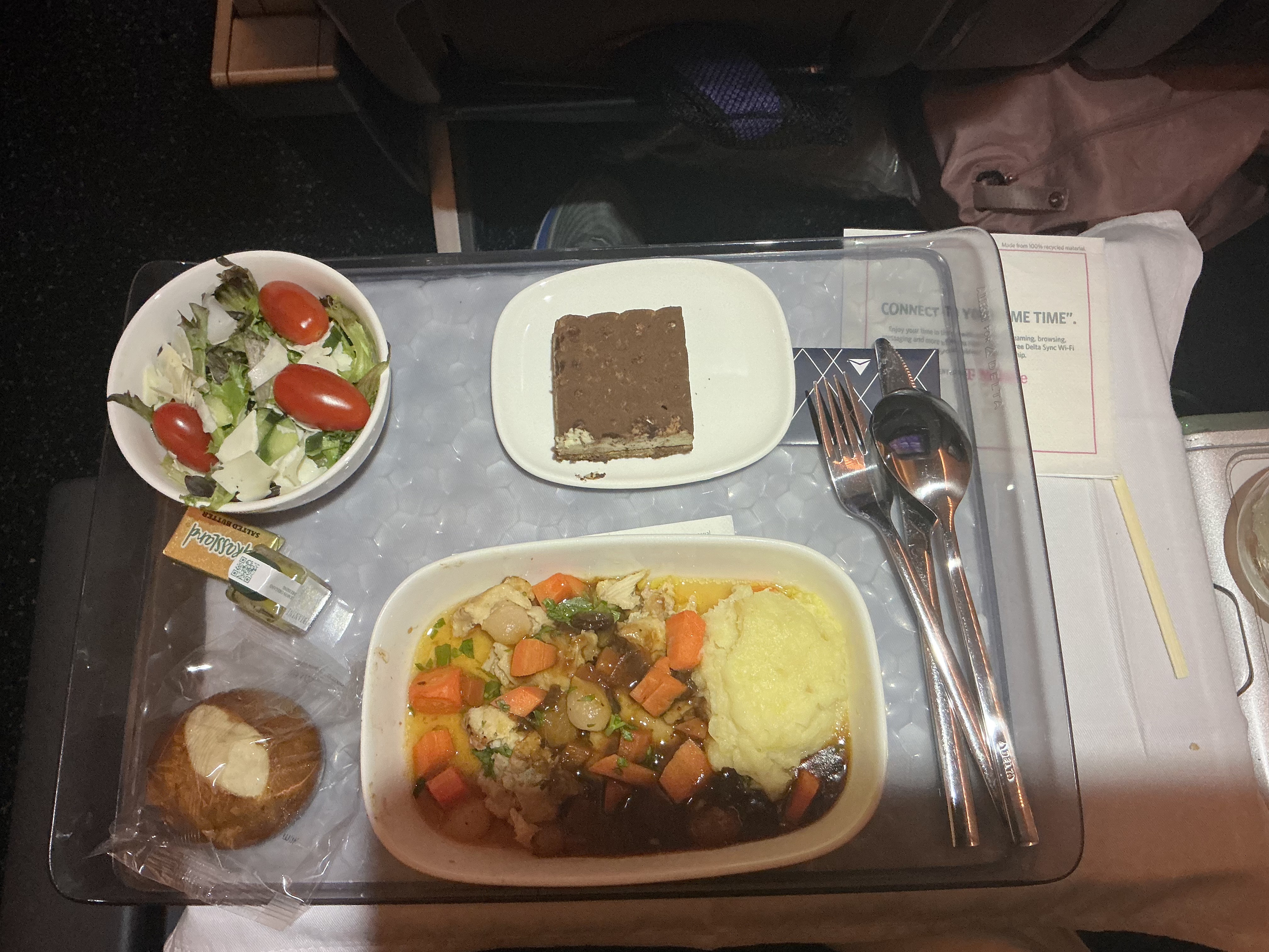 My chicken dinner on Delta - the G&T is off to the side!