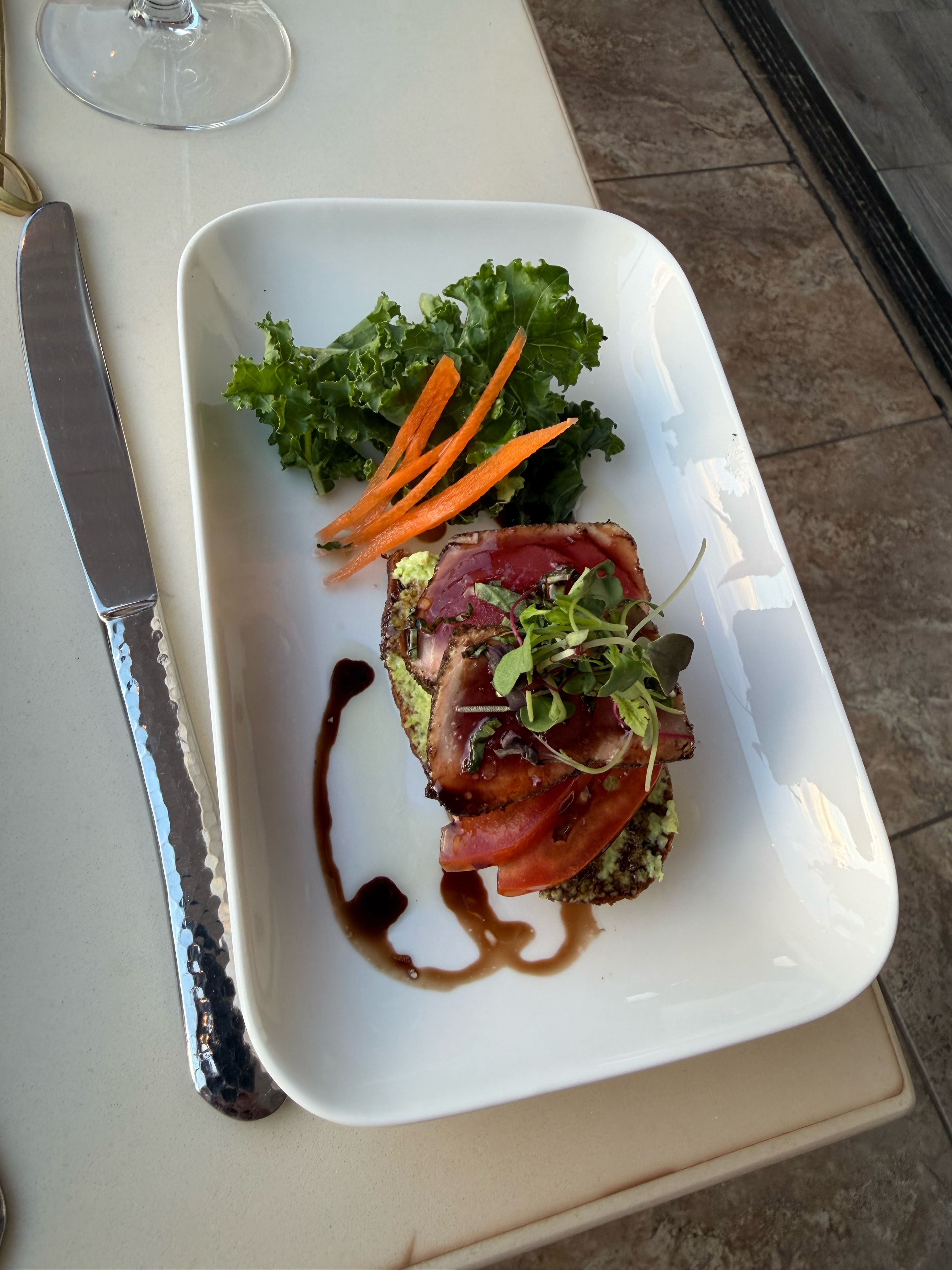 Locally sourced Ahi Tuna, flaxseed toast, edamame purée and Hawaiian tomato’s