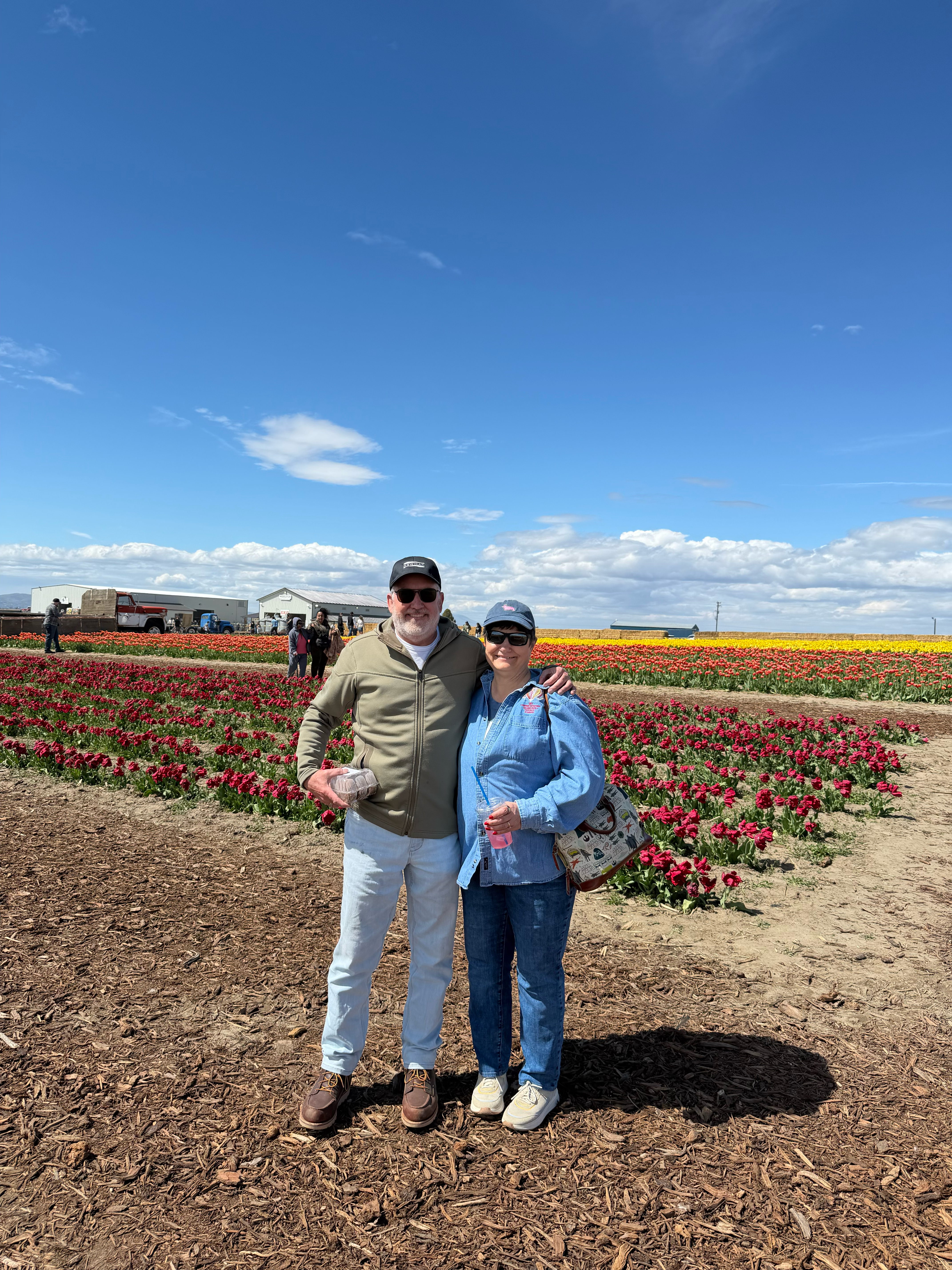 Thanks to couple passing by for taking our picture.  Yes - I am still clutching the left over donuts. 