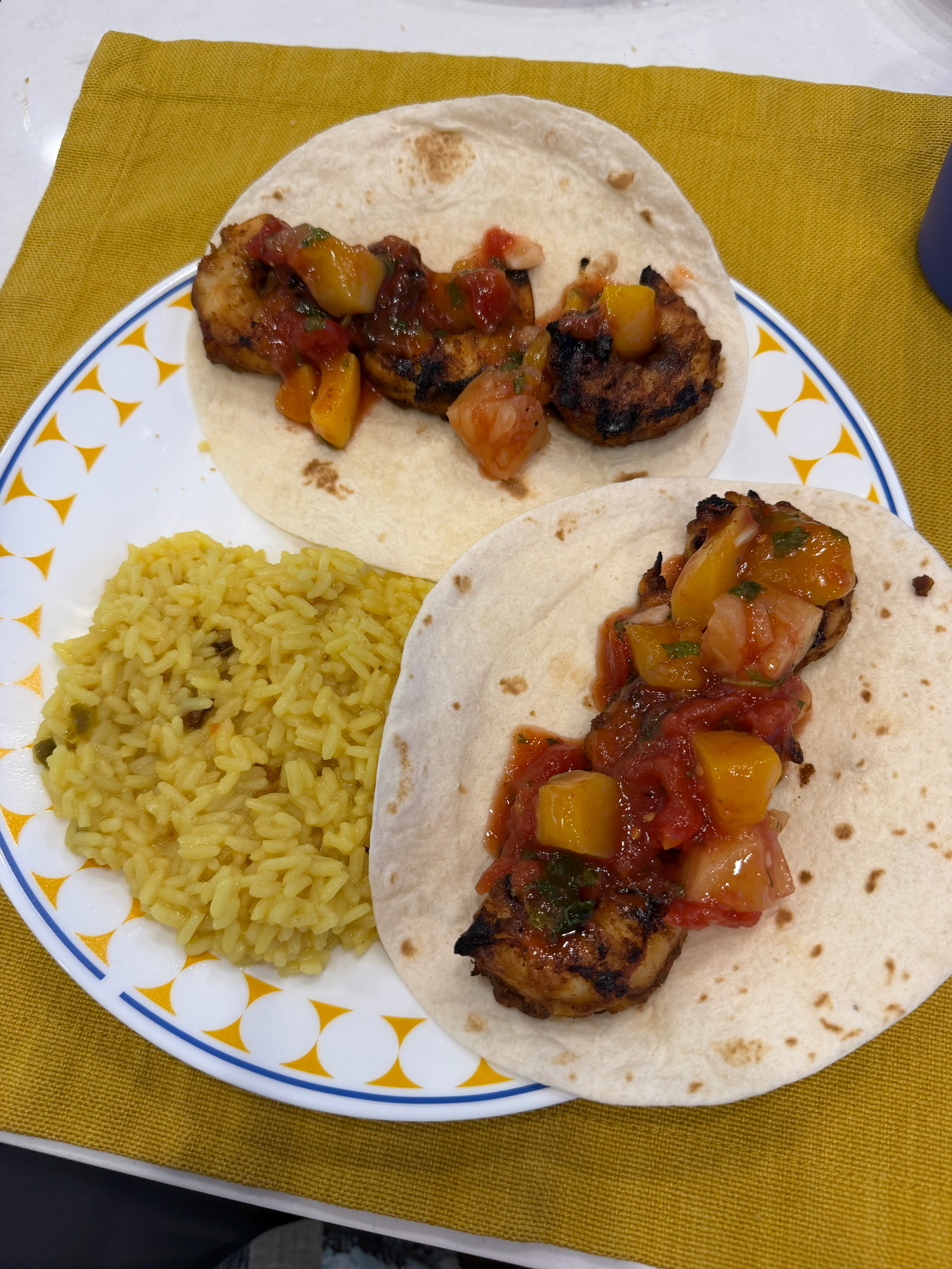 The grilled shrimp tacos with special seasoning and a Hawaiian salsa were excellent. 