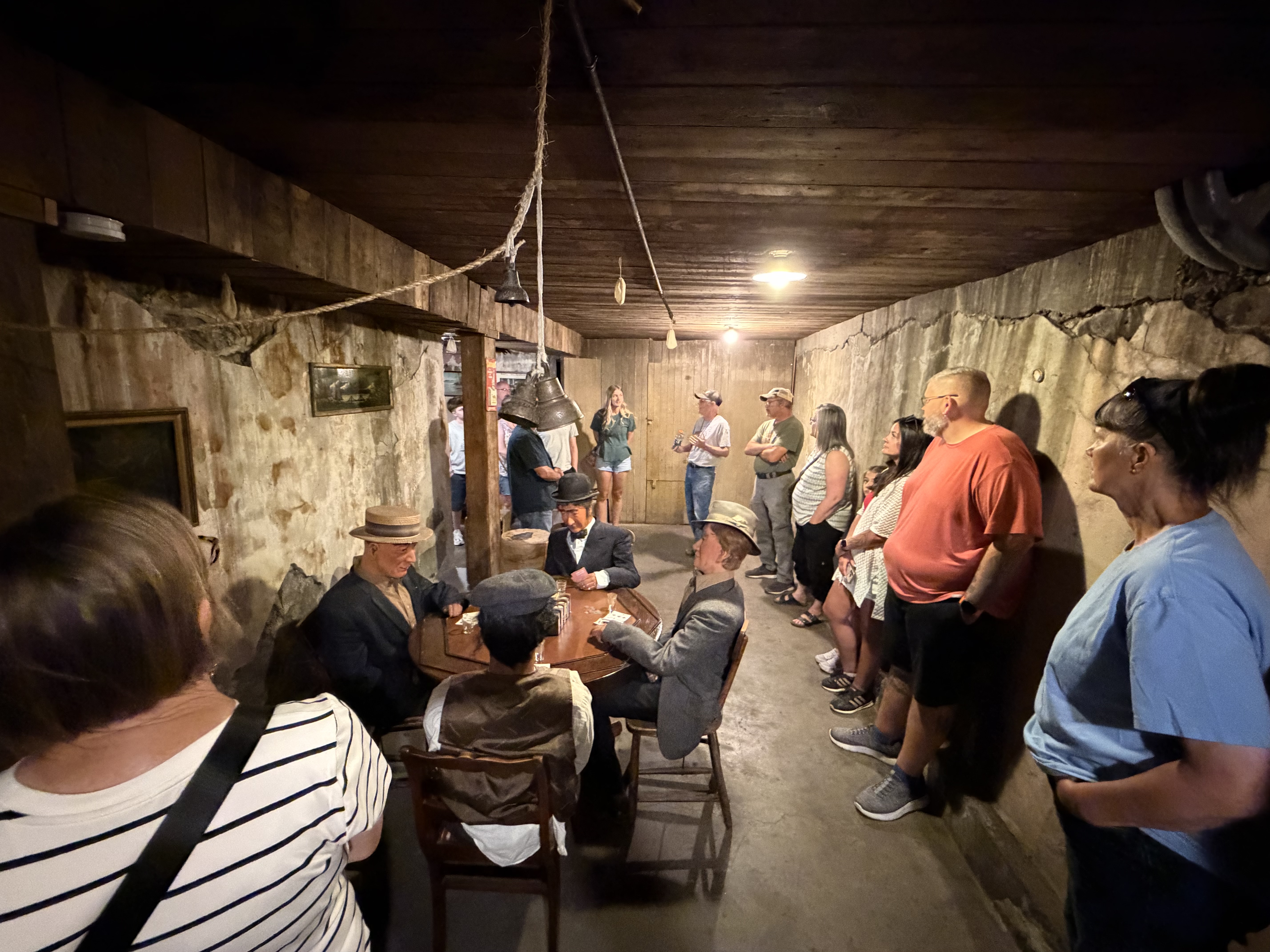 The prohibition era speakeasy bars had replica people sitting in chairs to provide a viewpoint on what things looked like in the day.  