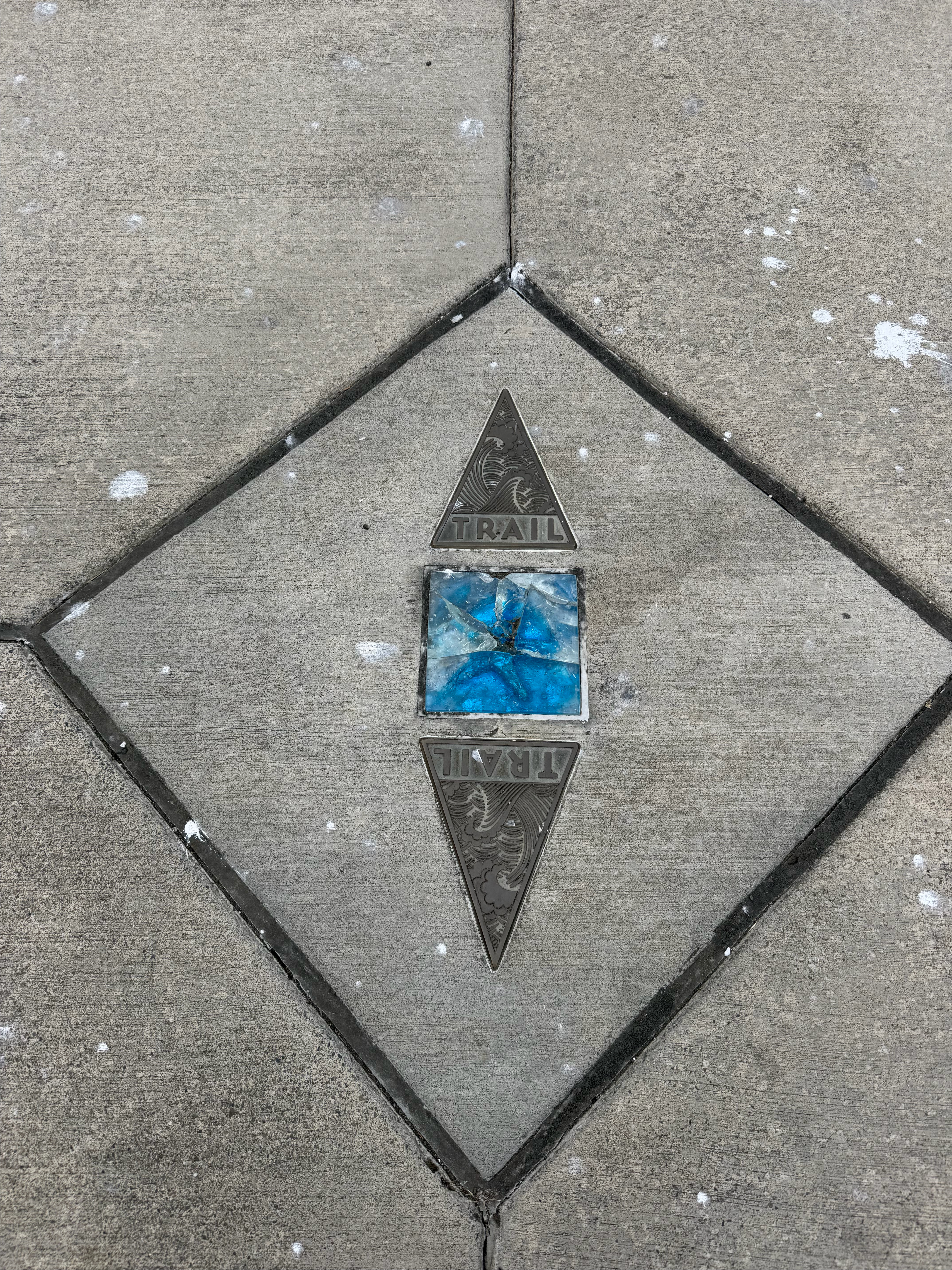 In lieu of signs - these markers were in the sidewalks near the ferry dock in downtown Port Angeles.