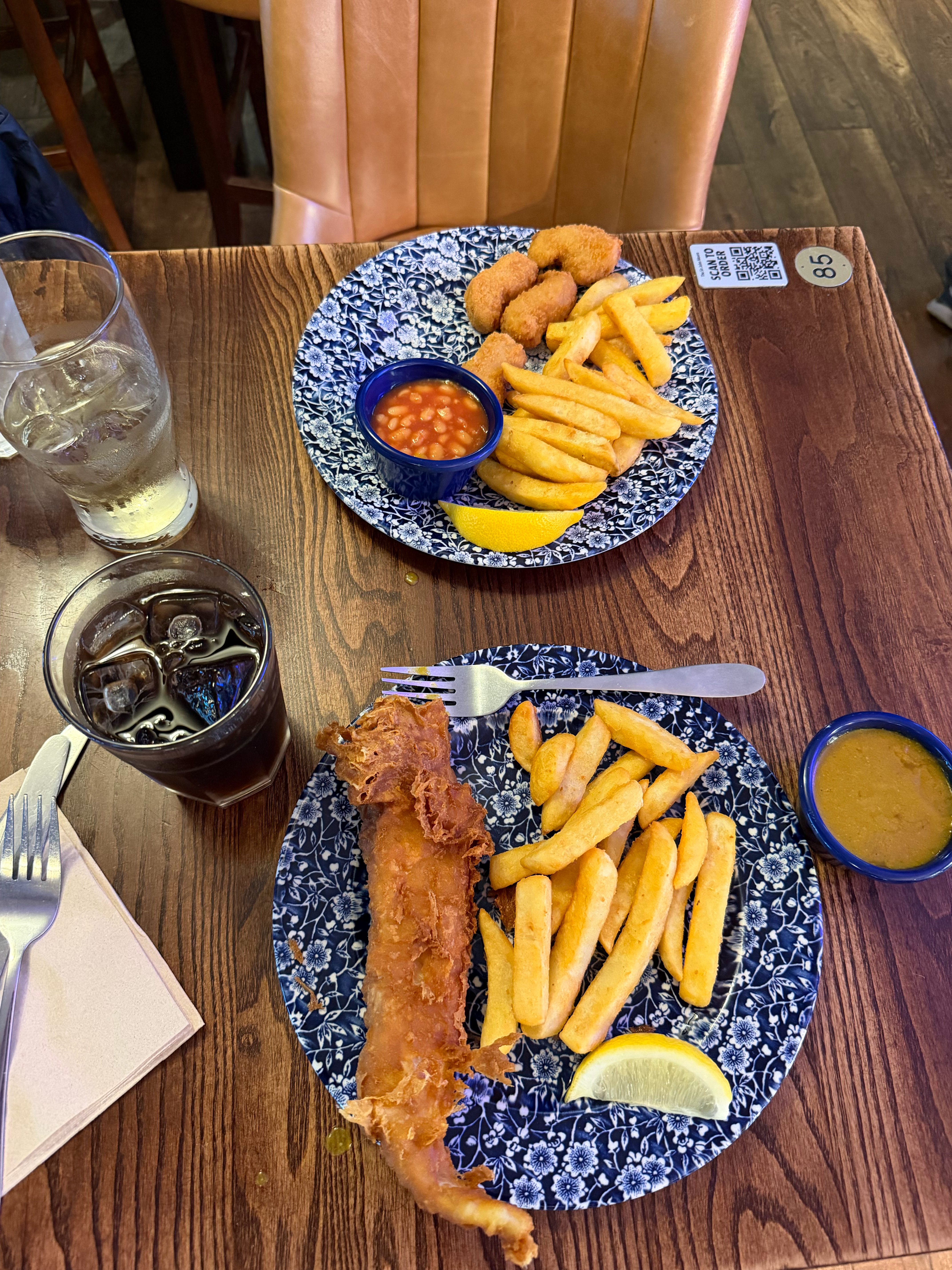 Some Glasgow pub grub - fish and chips and fried prawns and chips.  Noel had the very “tomatoey” baked beans and I had some pub curry sauce for my fish.  