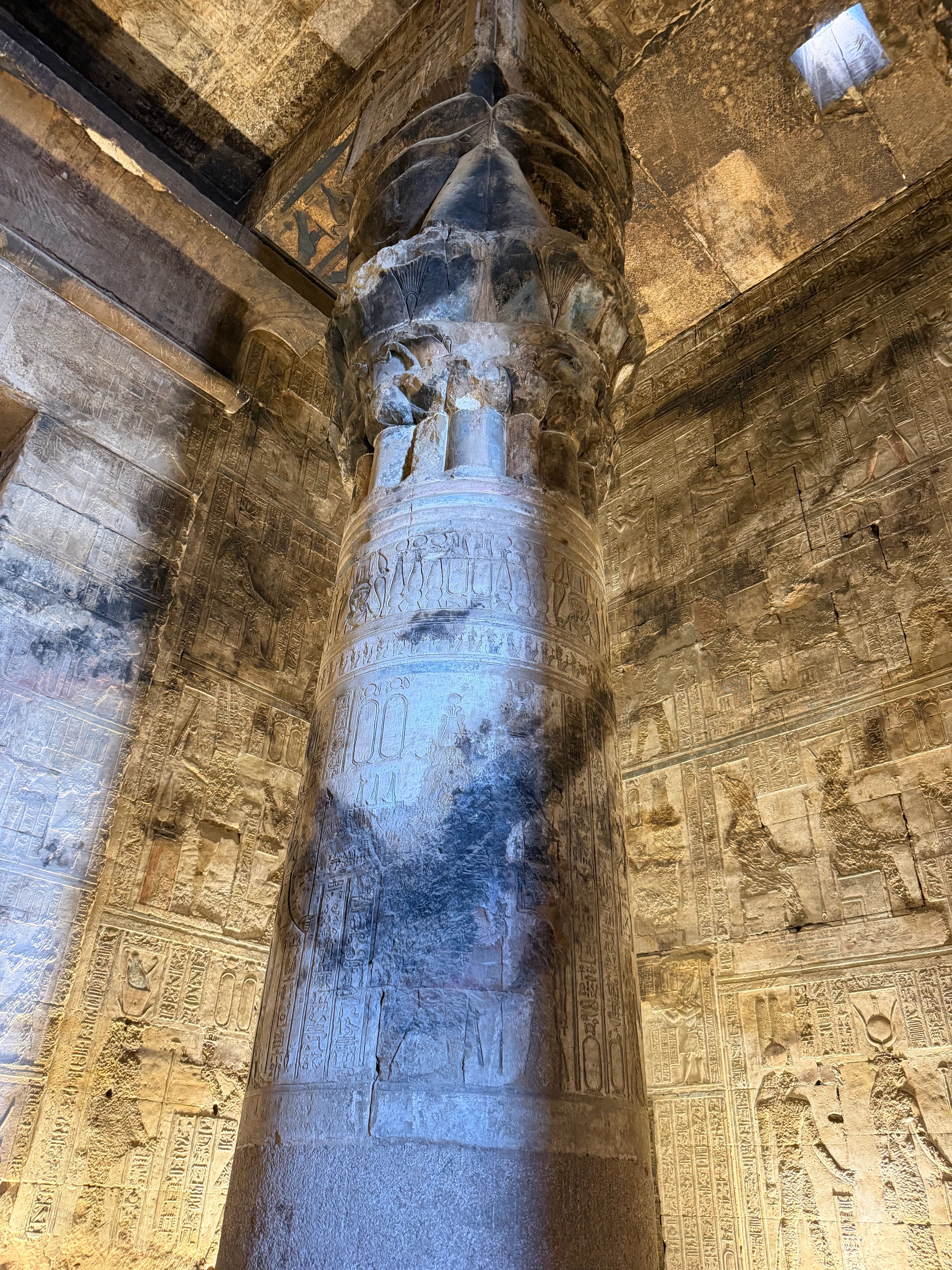 The black markings on the column were places that the soot from countless fires over the centuries had not been fully removed.