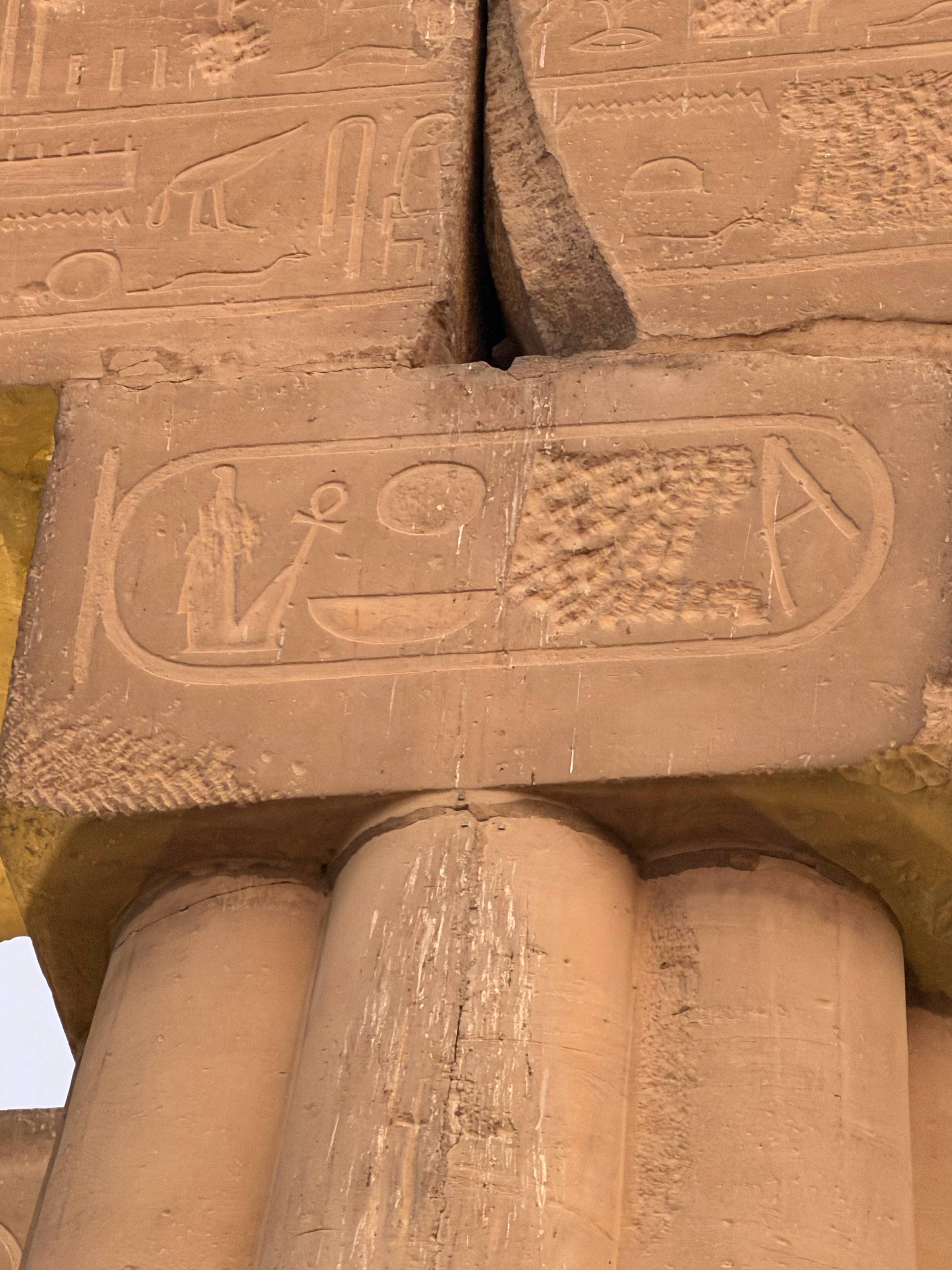 You can see where one of the hieroglyphs had an image in the cartouche chiseled out. 