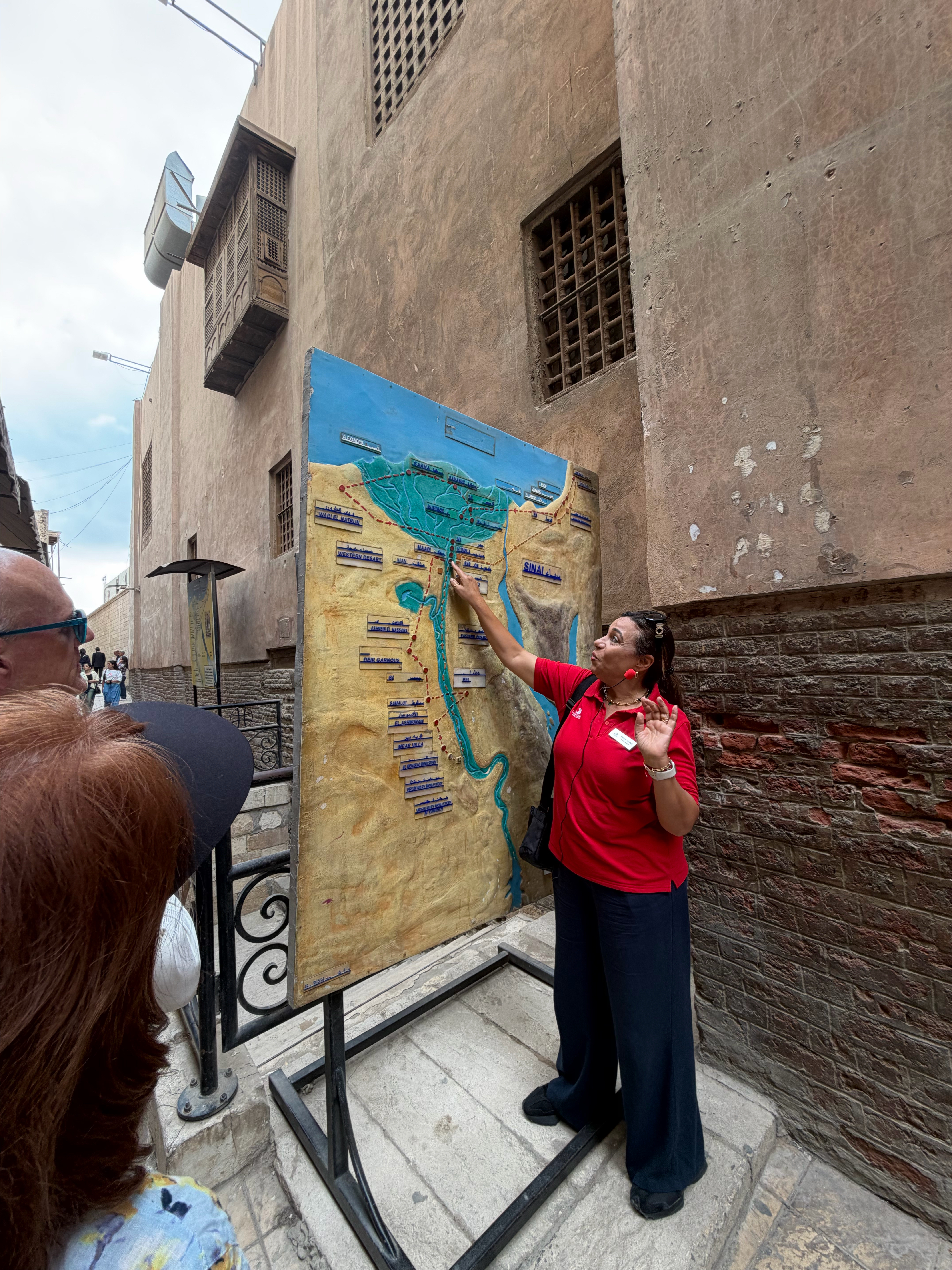Our Tour Guide showing us a map with details of the journey taken by the Holy Family through Egypt.