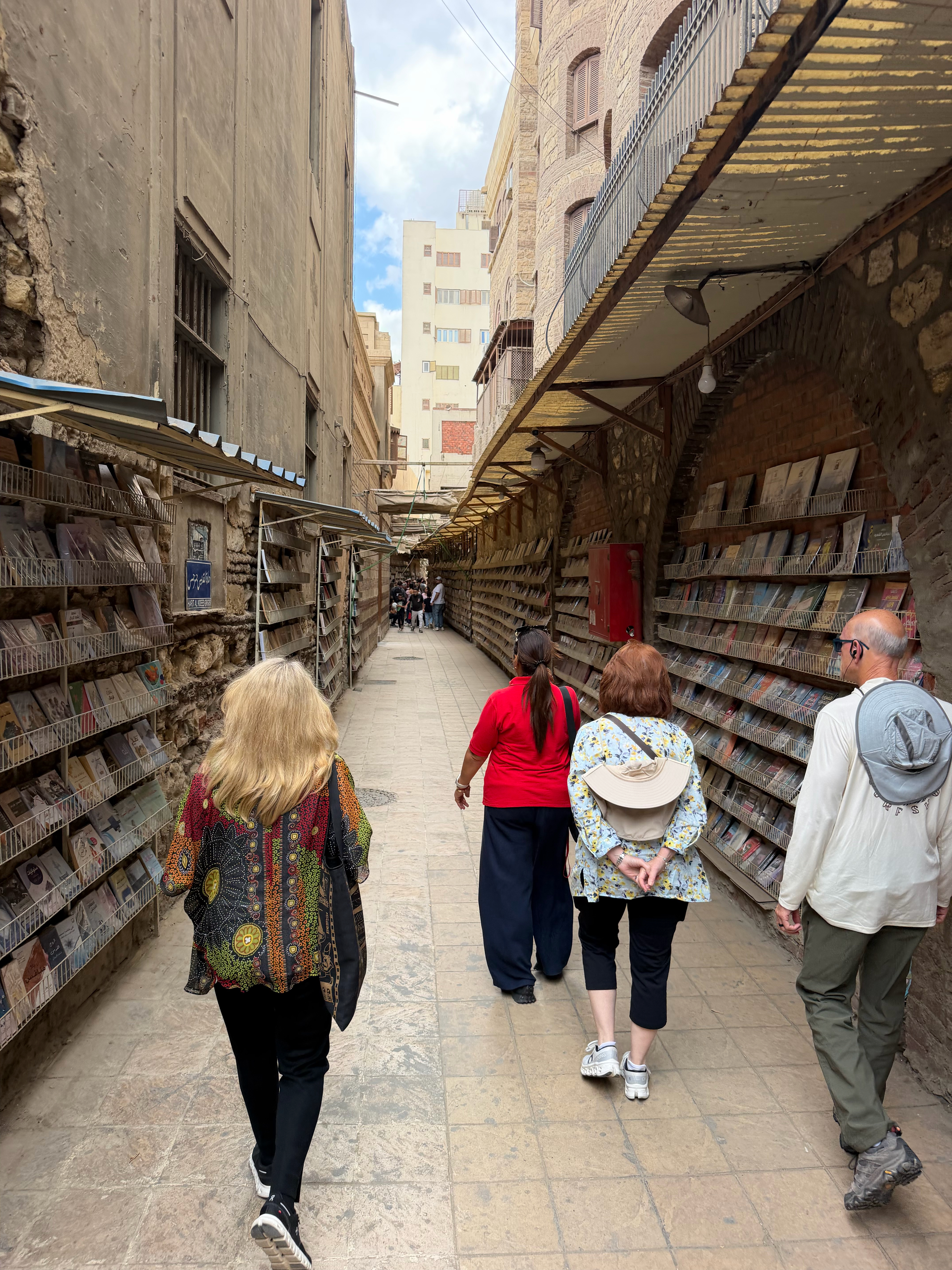 The walkways in the Coptic section of Cairo were narrow with books and pictures for sale all along the streets.